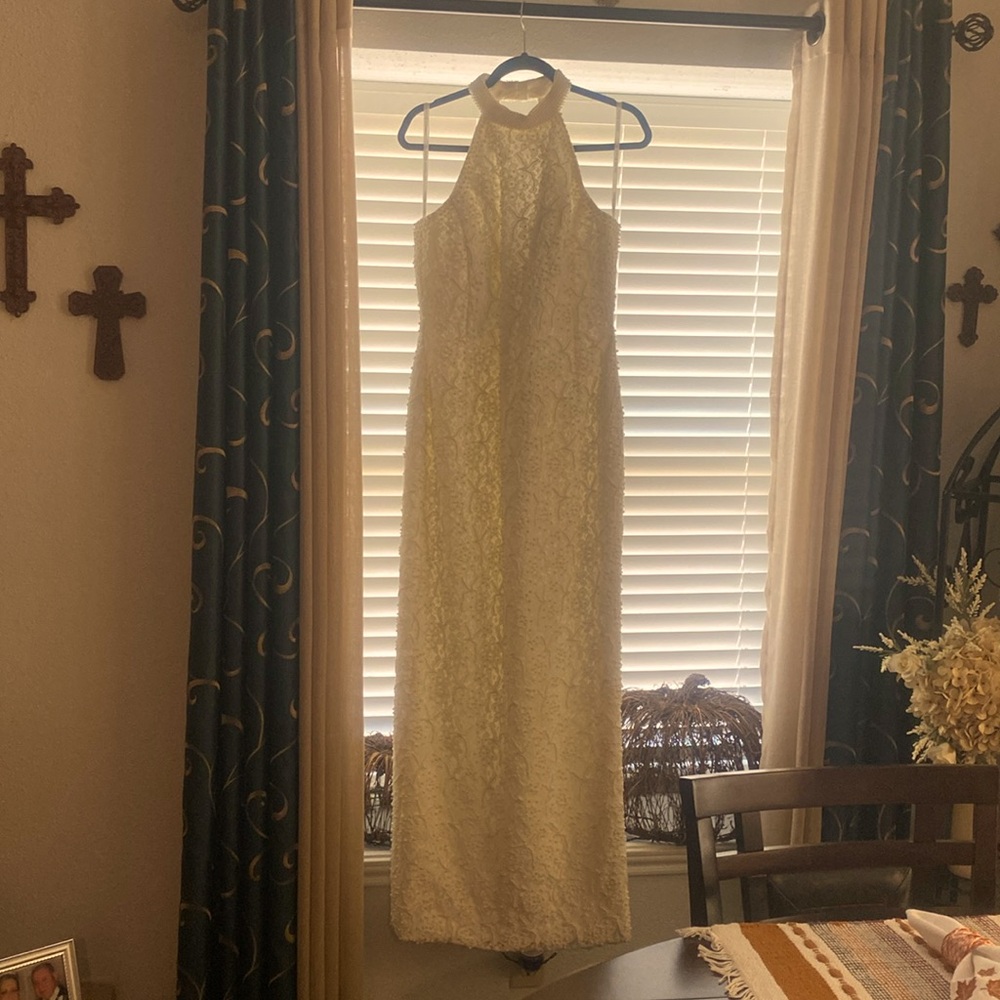 Ivory David’s Bridal. Size 14W. Great condition.